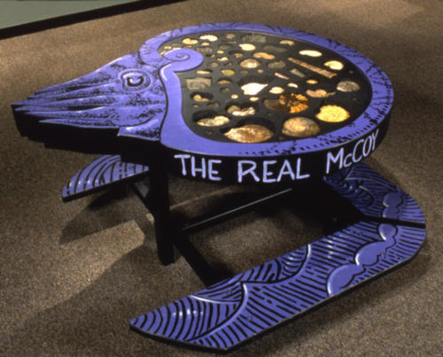 Ammonite fossil table designed and built by the exhibits department at DMNS